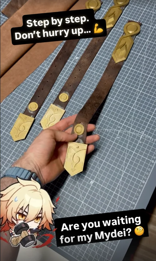 Behind the Work from Impossible Pleasure. Mydei Armor 3D Print straps with gold armor details during assembly.