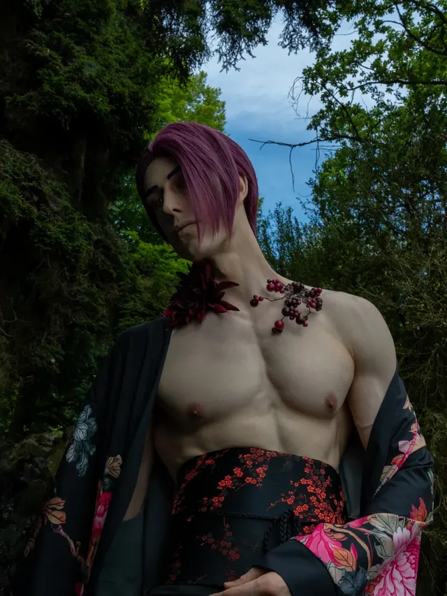 Dark cinematic cosplay portrait in a floral robe with purple hair.