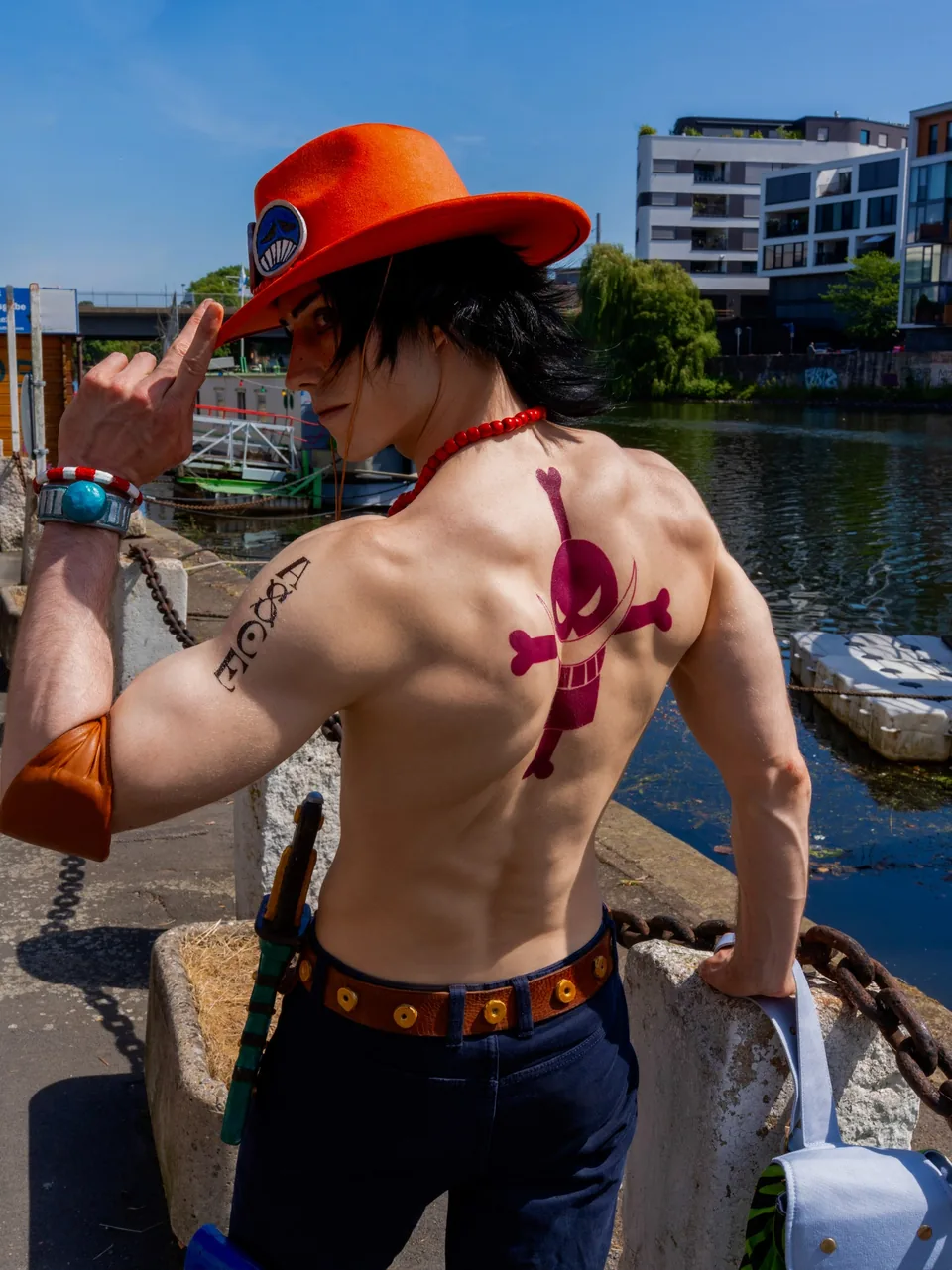 Portgas D. Ace cosplay with a sewn costume and handcrafted EVA-foam elements.
